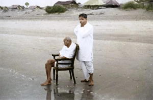 Mahatma Gandhi sitting on chair and Devdas Gandhi on Juhu Beach, Mumbai, Maharashtra, India, Asia, May 1944, Asia