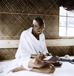 Mahatma Gandhi sitting and writing in his hut, Bangladesh, Asia, November 1946, Asia