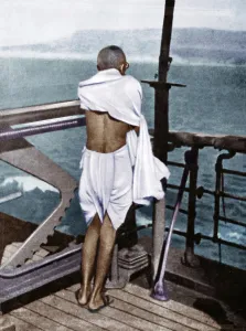 Mahatma Gandhi standing on deck of ship, voyage to England, Bombay, India, Asia, August 1931, Asia