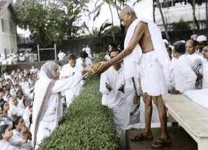 Mahatma Gandhi taking coconut before evening prayer meeting, Mumbai, India, Asia, May 1944, Asia