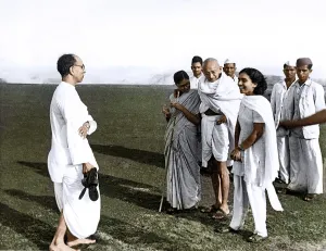 Mahatma Gandhi walking with Dr Sushila Nayar and Abha Gandhi, India, Asia, July 1944, Asia
