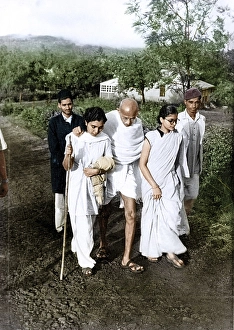 Mahatma Gandhi walking with Dr Sushila Nayar and Abha Gandhi, India, Asia, July 1944, Asia
