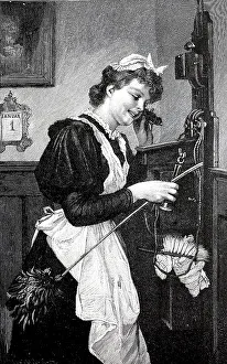 Maid using the telephone on 1 January for a New Year's greeting