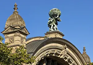 Main front of the main railway station with Atlas carrying the globe on his shoulders