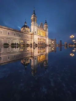 The majestic Almudena Cathedral of Madrid illuminated at dusk