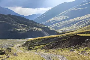 Majestic dirt road. Tien Shan mountains, Kirgizia