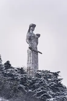 majestic mother georgia statue amidst snow covered trees tbilisis historic center Trending Item 4