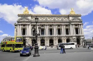 Majestic Palais Garnier opera house with impressive classical facade and golden statues