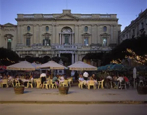 Malta Valletta Queens Spare with cafe Cordinana in front of the National Library