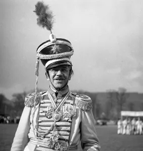 Man in Admiral's uniform, carnival around 1950