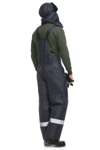 Man in blue work overalls and winter cap isolated full-length rearview