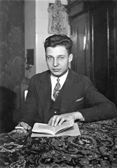 Man with a book, historical image, ca. 1936