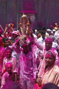 Man carrying idol on head, jyotiba temple