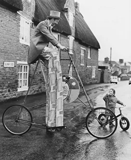 Man on curious big bike, England, Great Britain