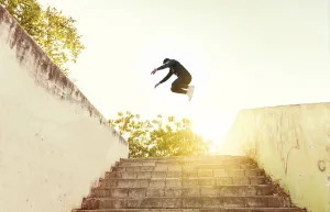 Man doing parkour jumping walls