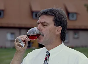 Man drinking red wine