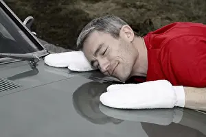 Man lovingly caring for his vintage car