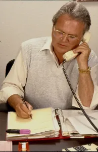 Man on the phone, appointment Office scene