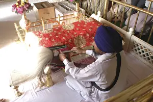 Man reading Adigranth, Akaltakhat Golden temple