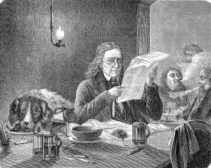 While the man reads the newspaper