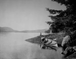 Man relaxing on the shore looking a