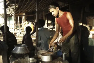 Man running tea stall, Kishanganj, Bihar, India
