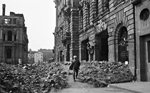 Man walks over Karl-Legien-Platz