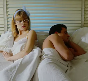 Man and woman in bed Woman wants sex