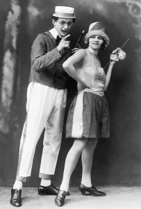 Man and woman wearing weird clothes