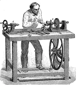 Man working at a lathe, lathe, for woodworking