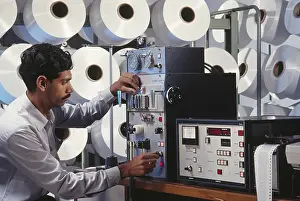 Man working in textile industry, india