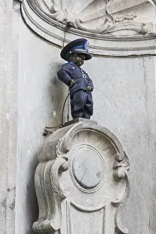 Manneken Pis as policeman, boy