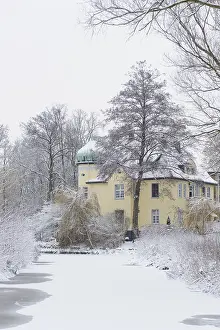 Manorial house in winter landscape