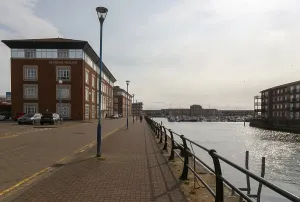 Marina House modern office and apartment building development on quays of marina