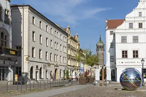 Market square with historic Cranach pharmacy and castle church tower