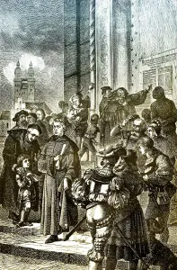 Martin Luther hammering his 95 theses to the door of the Castle Church in Wittenberg