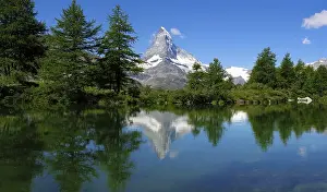 The Matterhorn is reflected in the Grindjisee near Zermatt