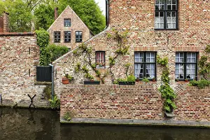 Medieval brick houses in Bruges (Brugge) along the canal