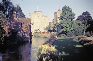 Medieval Westgate tower and gardens beside the River Stour, Canterbury, Kent, England, UK 1960