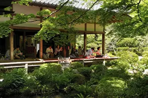 Meditating Japanese people in the Buddhist Sanzen-in temple in Ohara in Kyoto