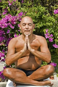 Meditating senior citizen