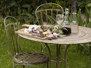 Mediterranean still life of a garden table covered with regional produce