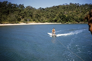 Melbourne Grammar School expedition to Queensland, Australia, 1956, probably a boy water skiing on the Whitsunday Islands, Oceania