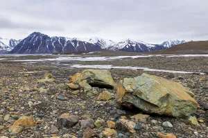 Framed Print : Melting glacier, copper-bearing stones