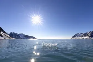 Melting ice in summer floating in Magdalenefjorden