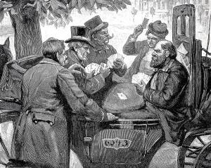 Men playing cards in a carriage