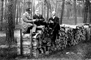 Men playing cards in the forest ca