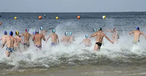 Men running into the sea, Swinoujscie