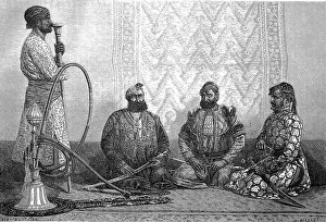 Men smoking hookah in a Hindustan teahouse in 1880