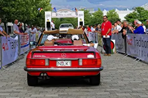 Mercedes Benz SL 500, red vintage convertible at an event